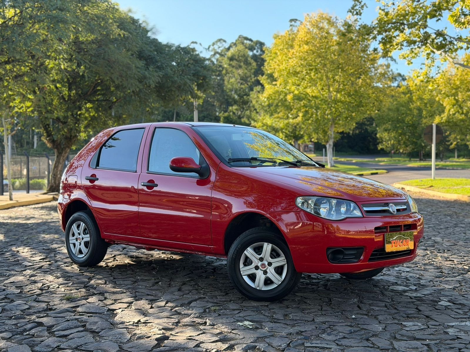 Fiat Palio 1.0 Cel. ECON./ITALIA F.Flex 8V 4p na cor Vermelho no Dois Irmãos / RS - 1005174