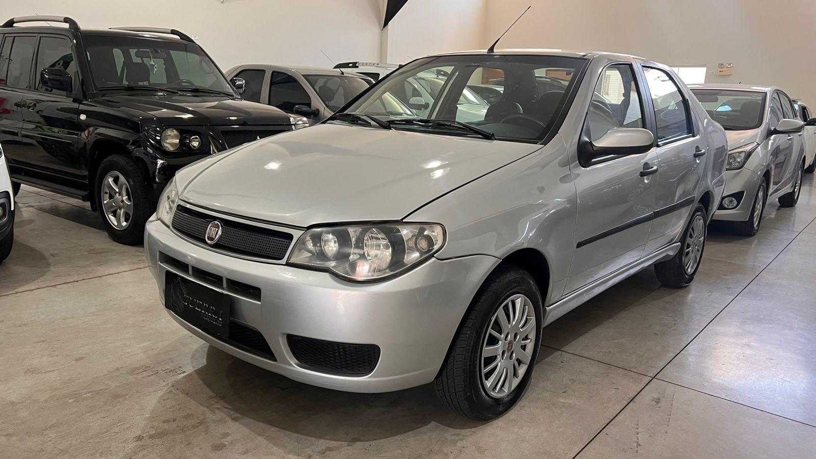 Fiat Siena Celebration 1.0 Fire Flex 8V 4p na cor Cinza em Maringá / PR - 1178