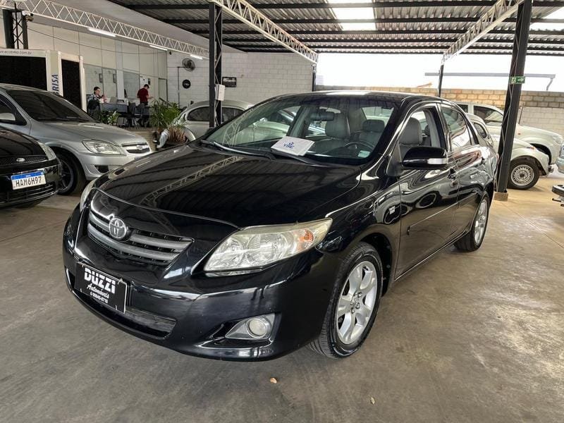 Toyota Corolla XEi 1.8/1.8 Flex 16V Mec. na cor Preto em Artur Nogueira / SP - 12602