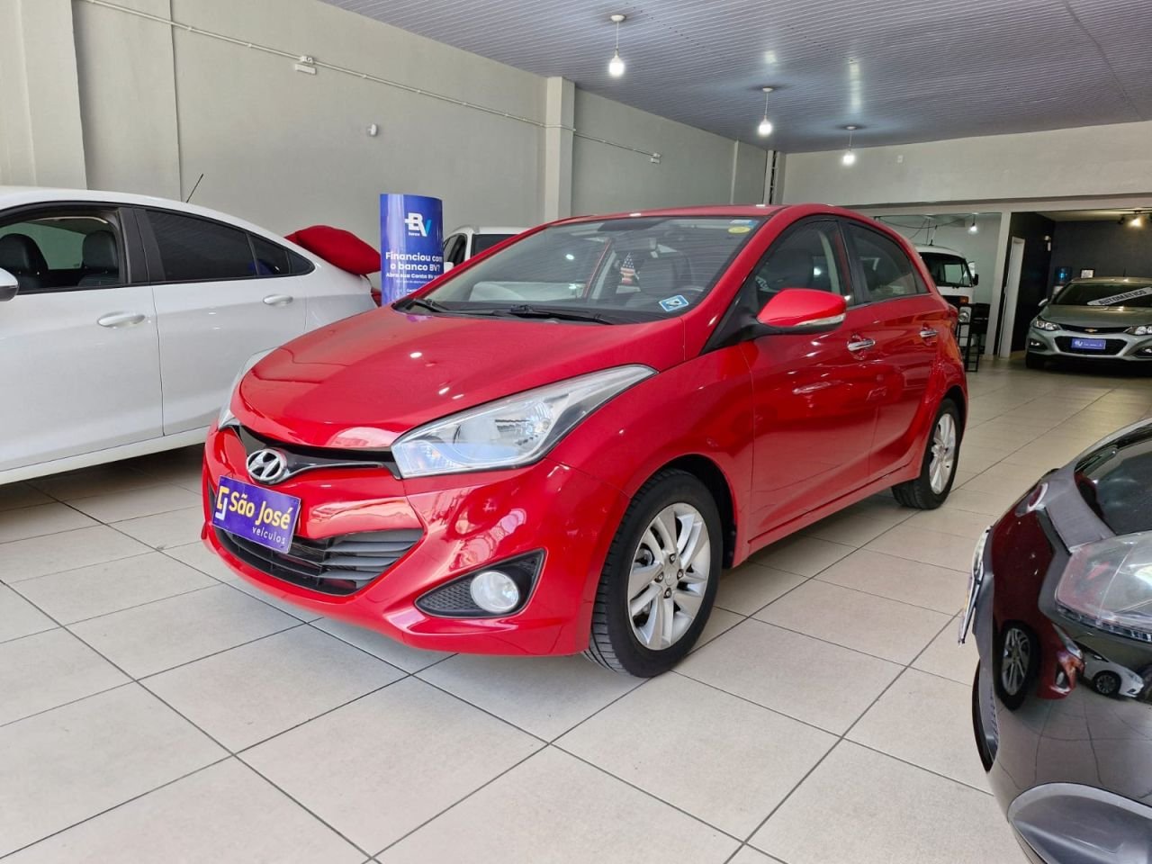 Hyundai HB20 Premium 1.6 Flex 16V Aut. na cor Vermelho em São José / SC - 13340