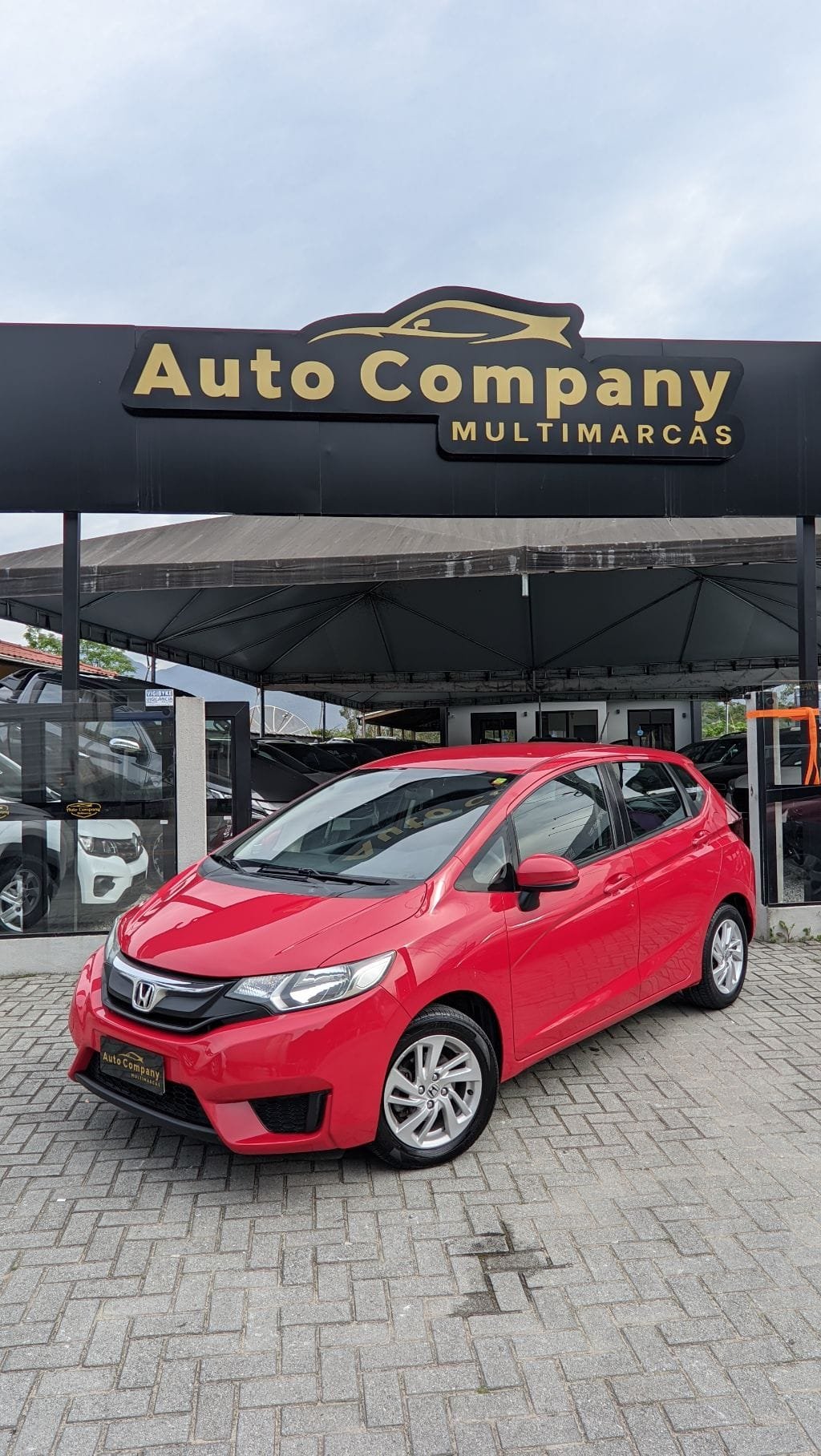 Honda Fit LX 1.5 Flexone 16V 5p Mec. na cor Vermelho em Santo Amaro da Imperatriz / SC - 13513