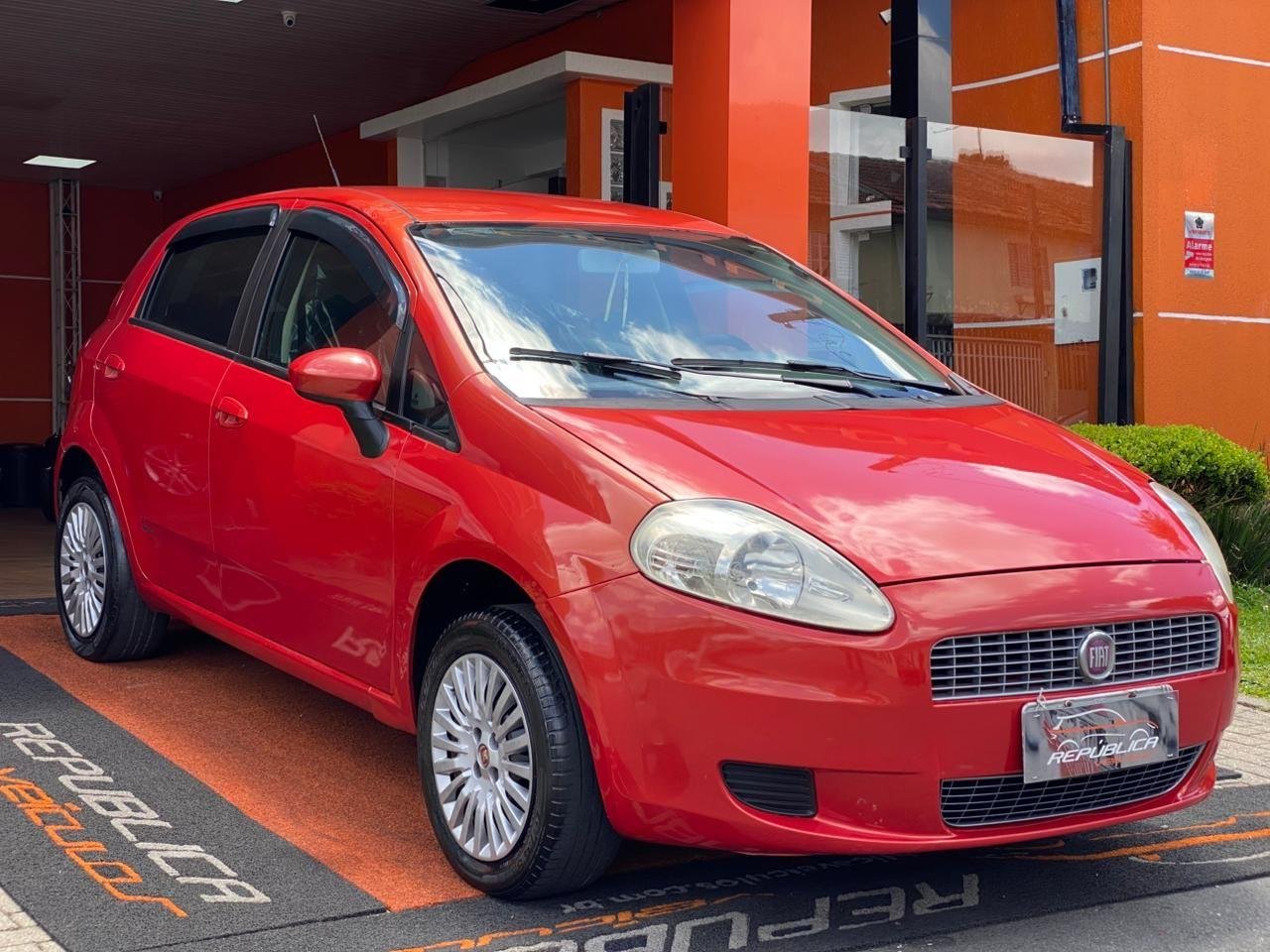 Fiat Punto 1.4 Fire Flex 8V 5p na cor Laranja em Curitiba / PR - 13611