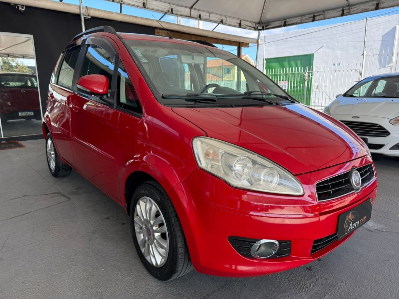 Fiat Idea ATTRACTIVE 1.4 Fire Flex 8V 5p na cor Vermelho em Palhoça / SC - 20481