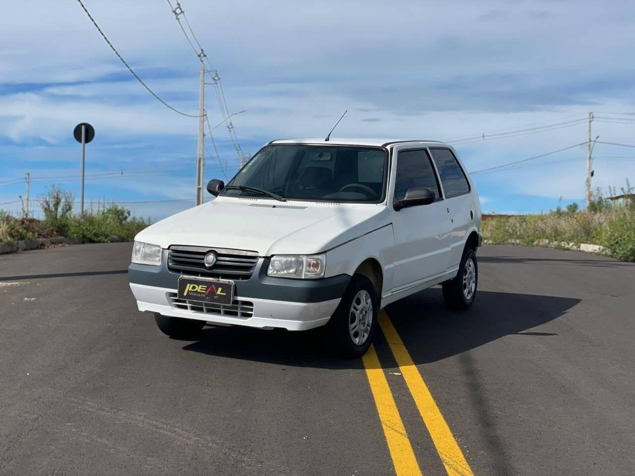 Fiat Uno Mille 1.0 Fire/ F.Flex/ ECONOMY 4p na cor Branco em Xanxerê / SC - 23174