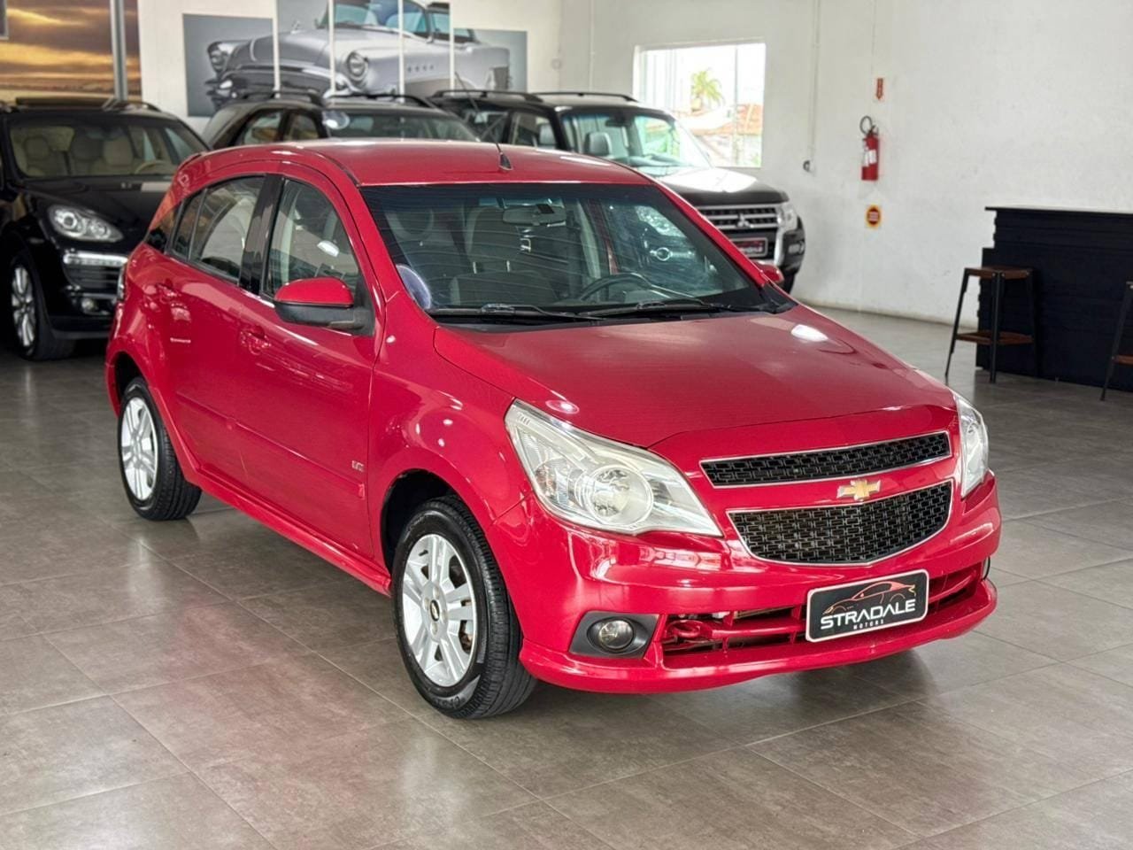 Chevrolet Agile LTZ 1.4 MPFI 8V FlexPower 5p na cor Vermelho em Gaspar / SC - 24642