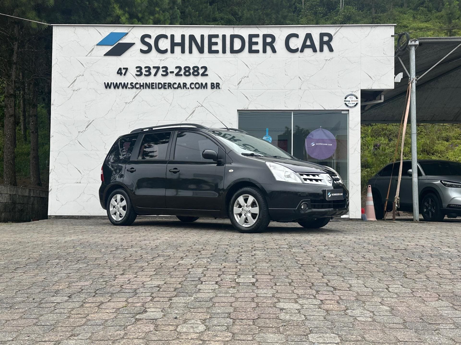 Nissan LIVINA SL 1.6 16V Flex Fuel 5p na cor Preto em Guaramirim / SC - 35406