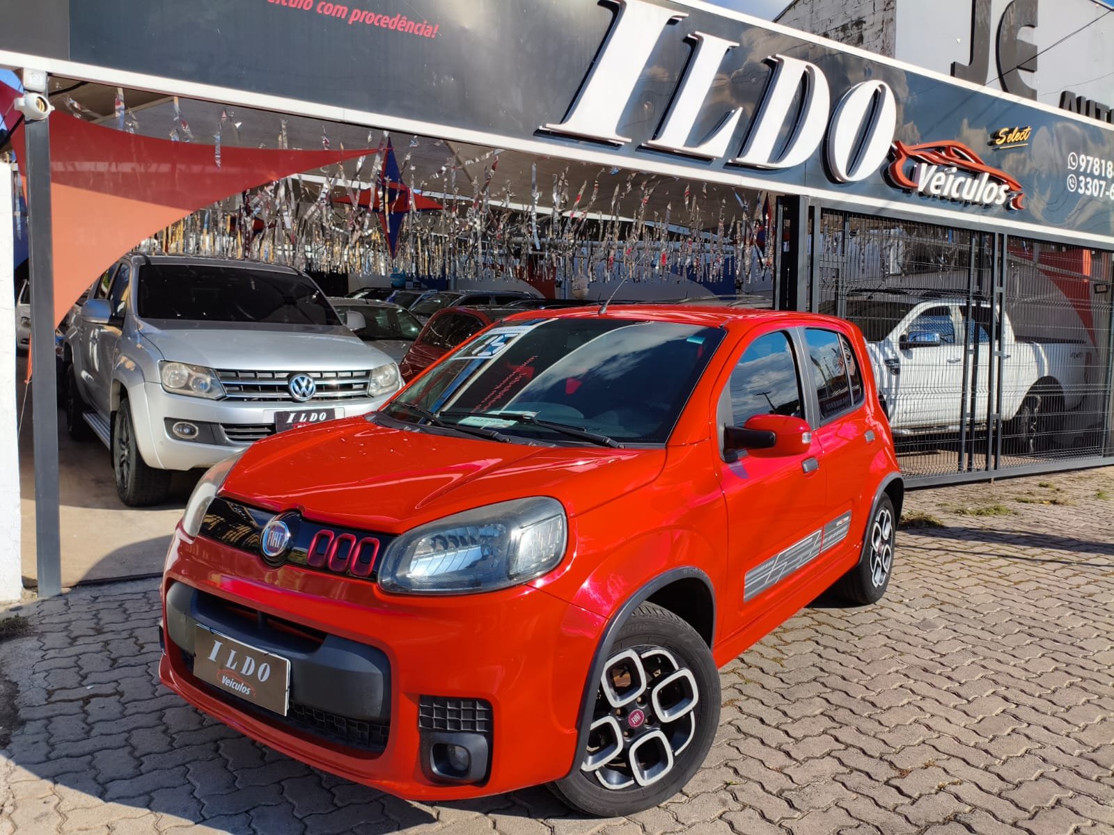 Fiat Uno SPORTING 1.4 EVO Fire Flex 8V 4p na cor Vermelho em Campinas / SP - 3663