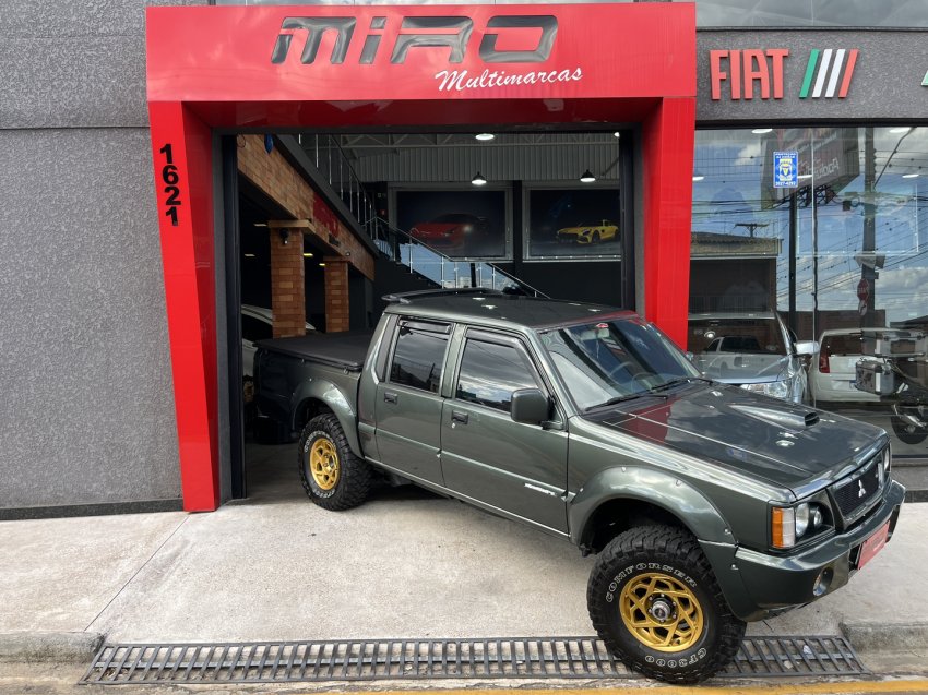 Mitsubishi L200 HPE 2.5 8V 95cv/118cv TB-IC Diesel na cor Verde em Ponta Grossa / PR - 40086
