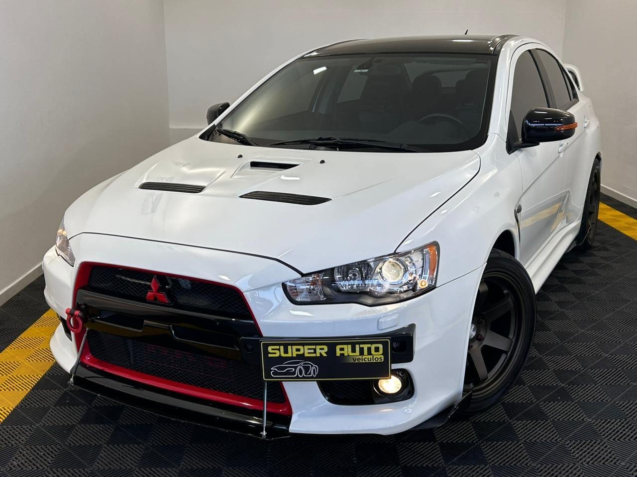 Mitsubishi Lancer Evol. X J. Easton 2.0 16V TB Int. na cor Branco em Blumenau / SC - 40405