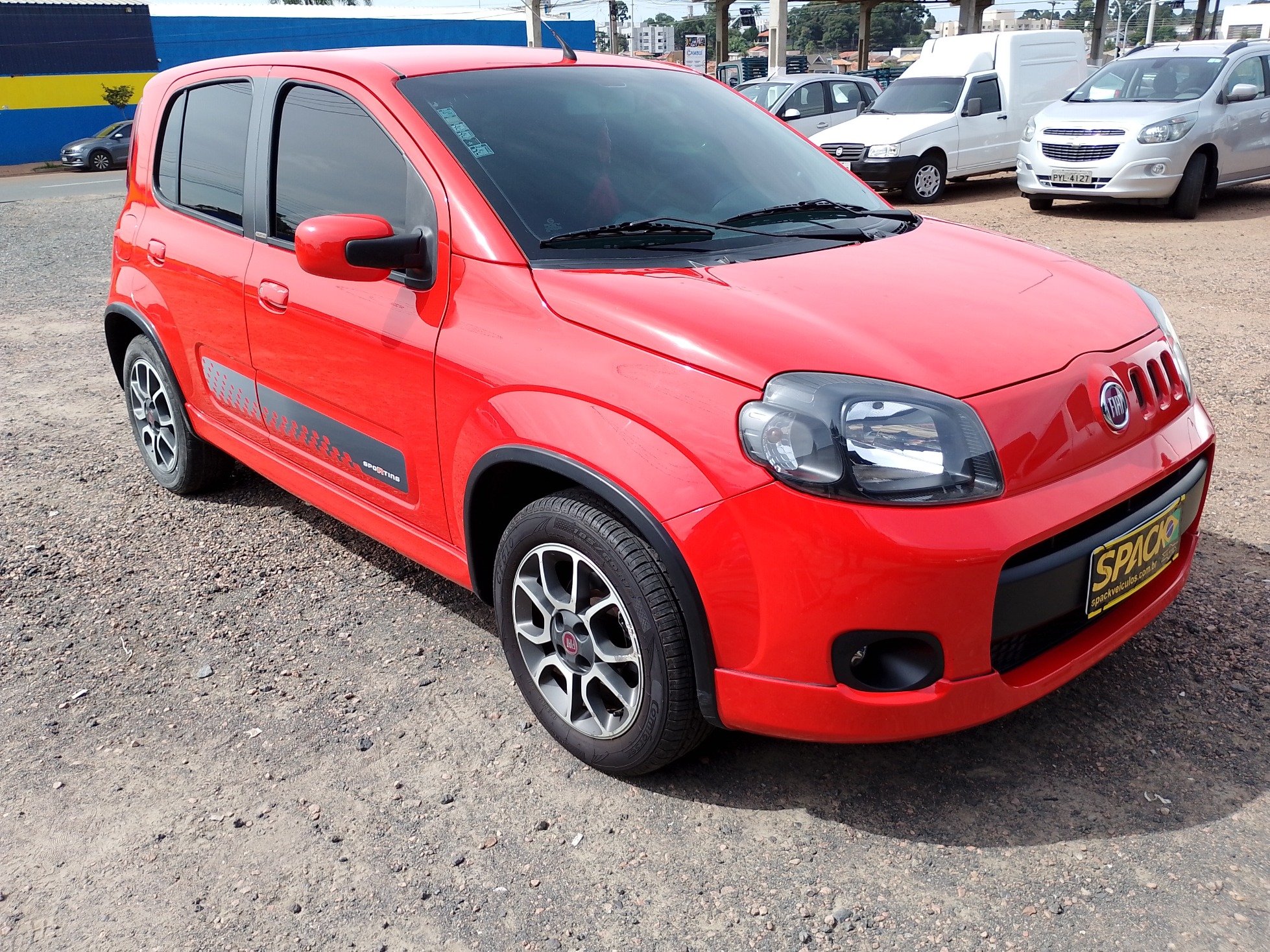 Fiat Uno SPORTING 1.4 EVO Fire Flex 8V 4p na cor Vermelho em Campo Largo / PR - 52069