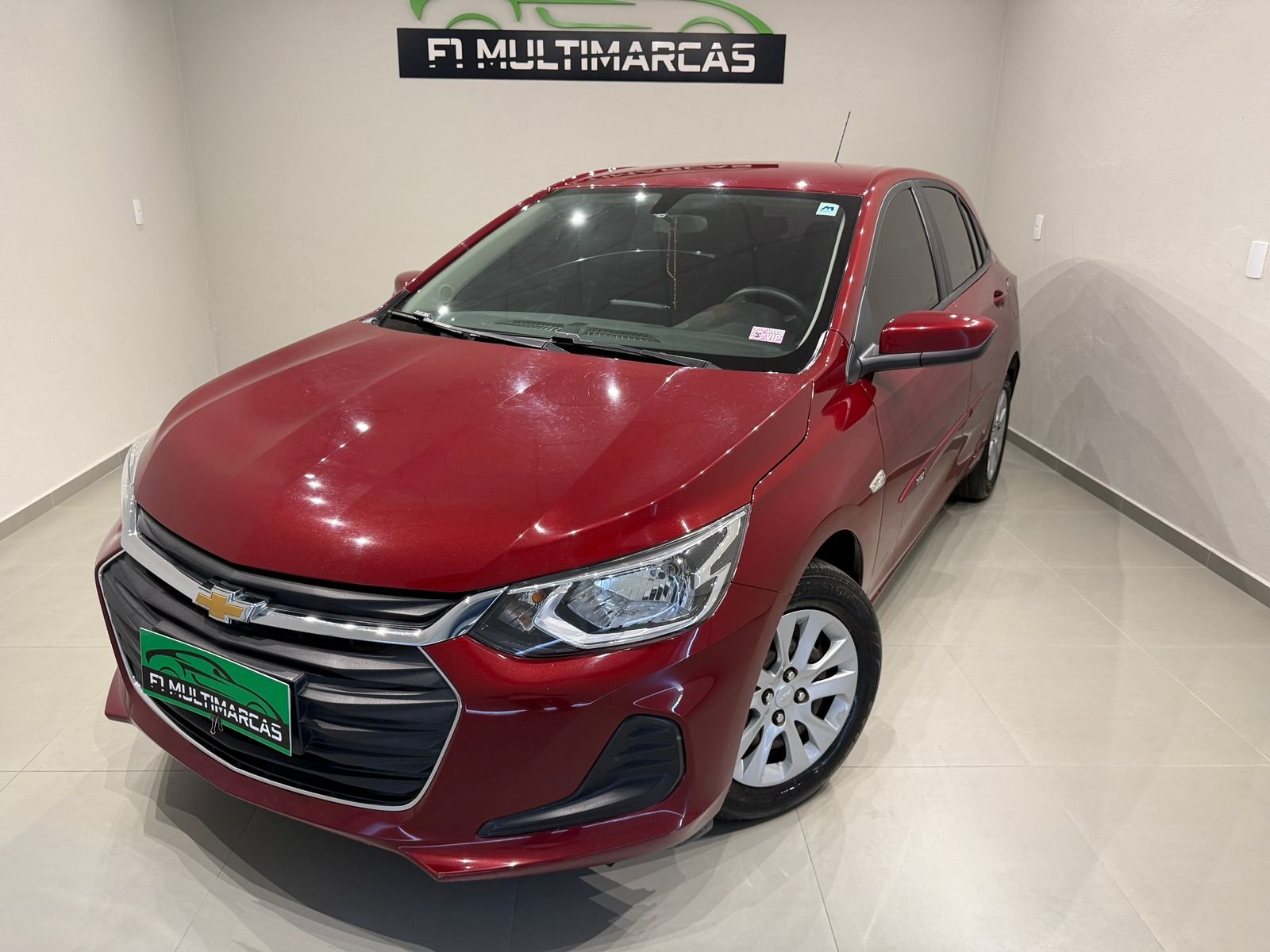 Chevrolet Onix HATCH 1.0 12V TB Flex 5p Aut. na cor Vermelho em Joinville / SC - 795583