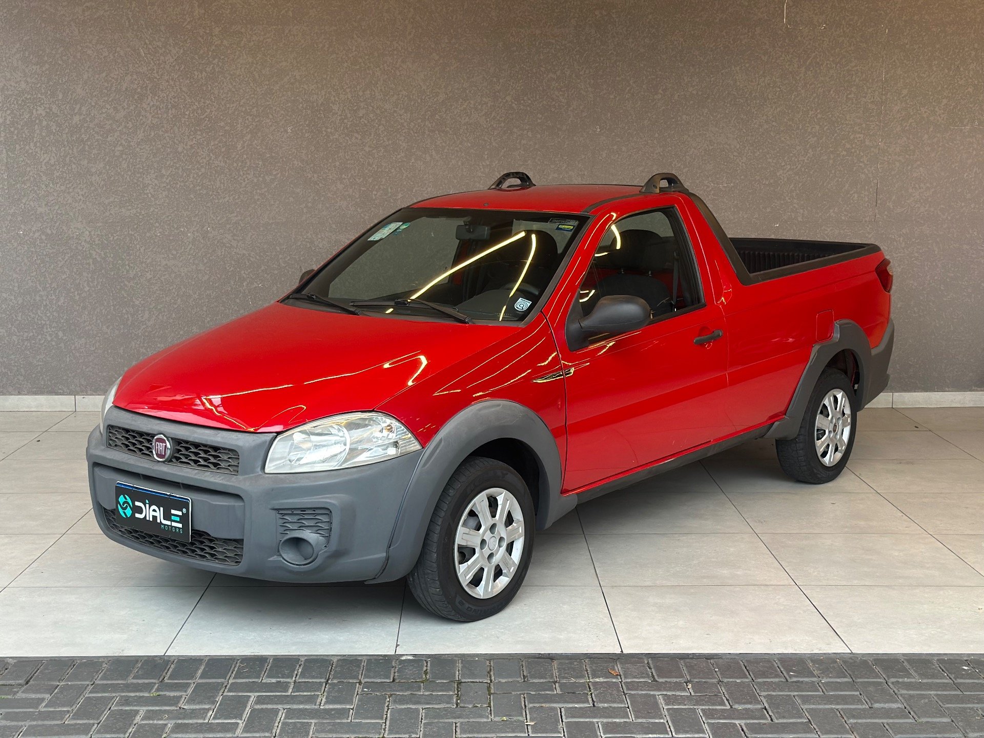 Fiat Strada Working HARD 1.4 Fire Flex 8V CS na cor Vermelho em Curitiba / PR - 869701