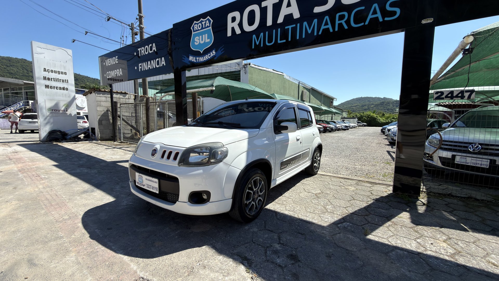 Fiat Uno SPORTING 1.4 EVO Fire Flex 8V 4p na cor Branco em Florianópolis / SC - 905423