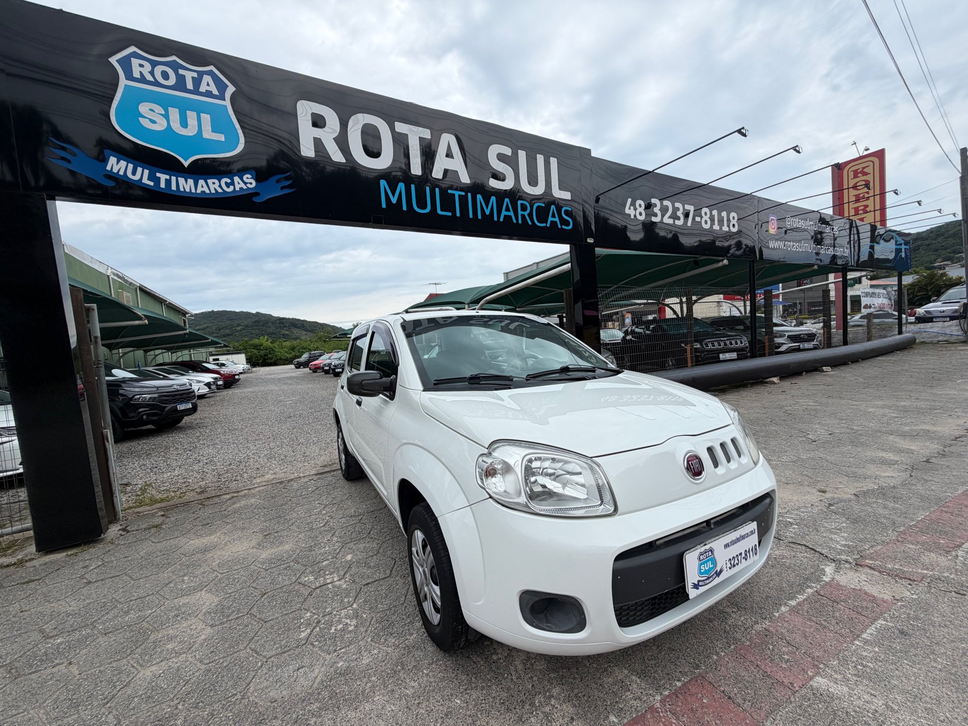 Fiat Uno VIVACE College 1.0 EVO FireFlex 5p na cor Branco em Florianópolis / SC - 905425