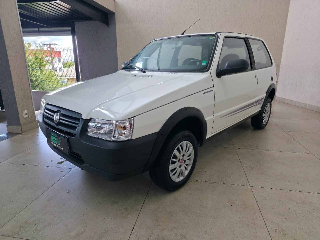 Fiat Uno Mille WAY ECONOMY 1.0 F.Flex 2p na cor Branco em Ponta Grossa / PR - 925156