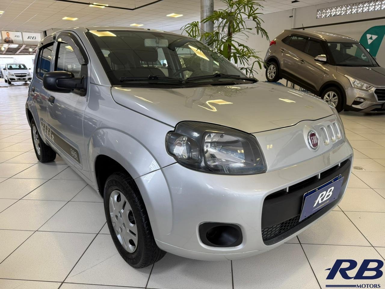 Fiat Uno VIVACE/RUA 1.0 EVO Fire Flex 8V 5p na cor Prata em Florianópolis / SC - 944806