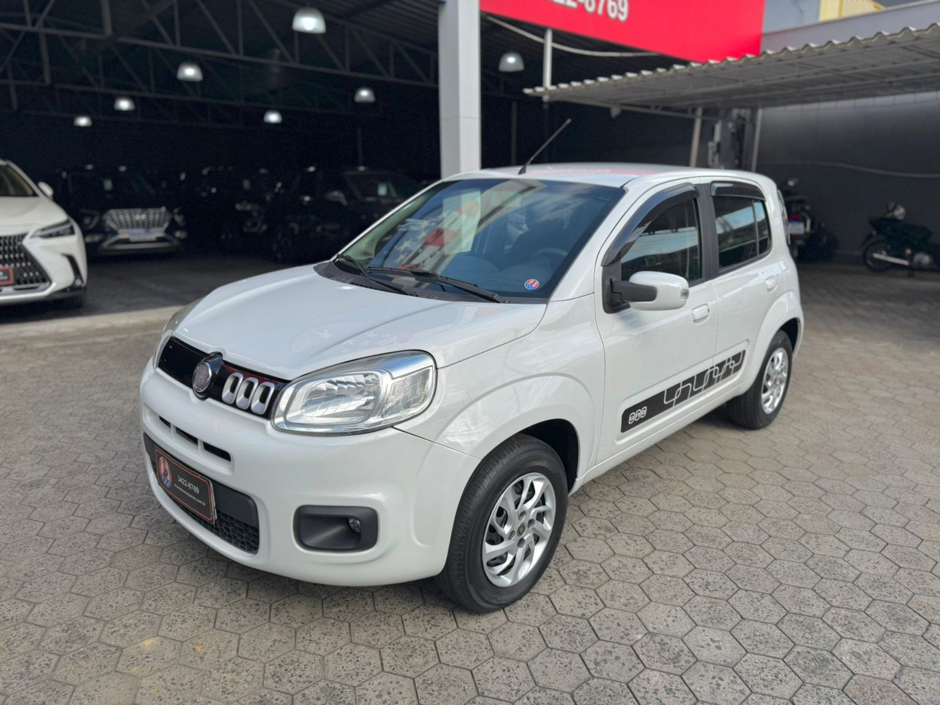 Fiat Uno EVOLUTION 1.4 Fire Flex 8V 5p na cor Branco em Joinville / SC - 945128
