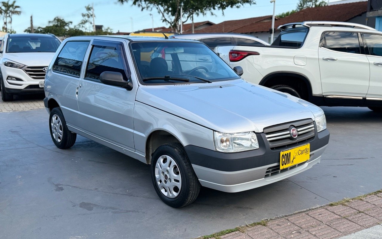 Fiat Uno Mille 1.0 Fire/ F.Flex/ ECONOMY 2p na cor Cinza em Joinville / SC - 957674