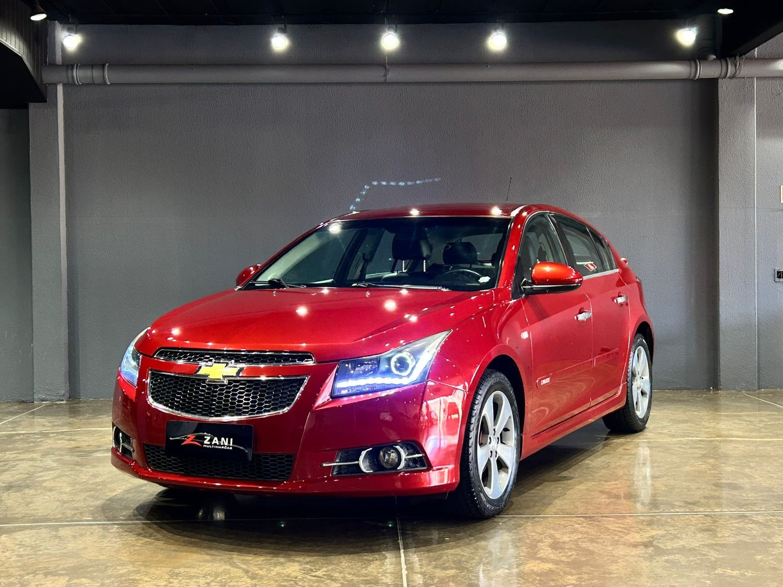 Chevrolet Cruze HB Sport LT 1.8 16V FlexP. 5p Mec na cor Vermelho em Cascavel / PR - 962766