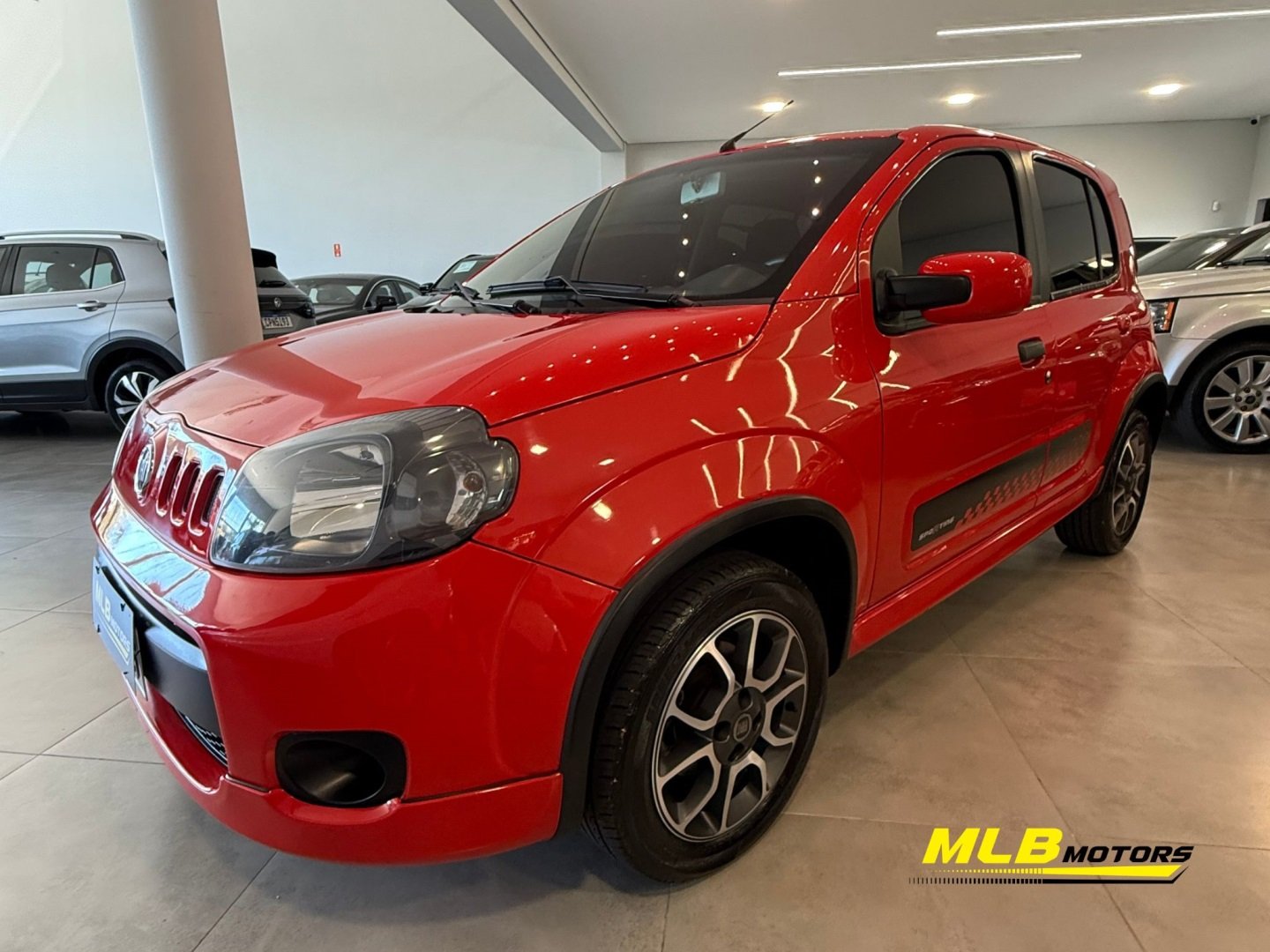 Fiat Uno SPORTING 1.3 Flex 8V 5p na cor Vermelho em Campinas / SP - 962983