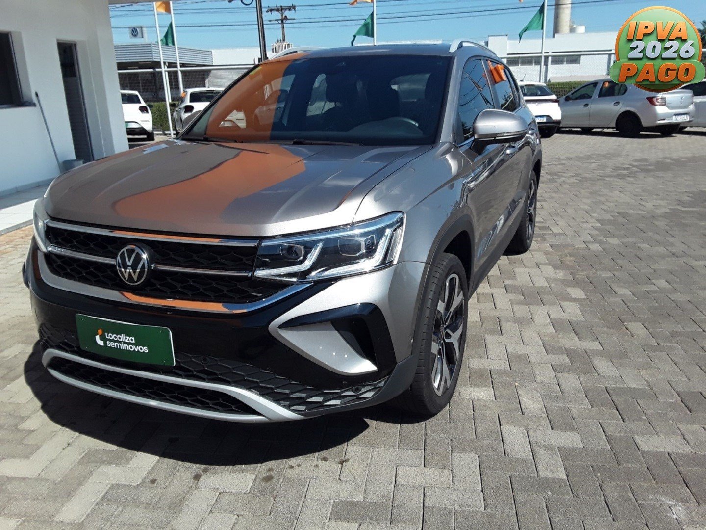 Volkswagen Taos Highline 1.4 250 TSI Flex Aut. na cor Bege em Maringá / PR - 968375