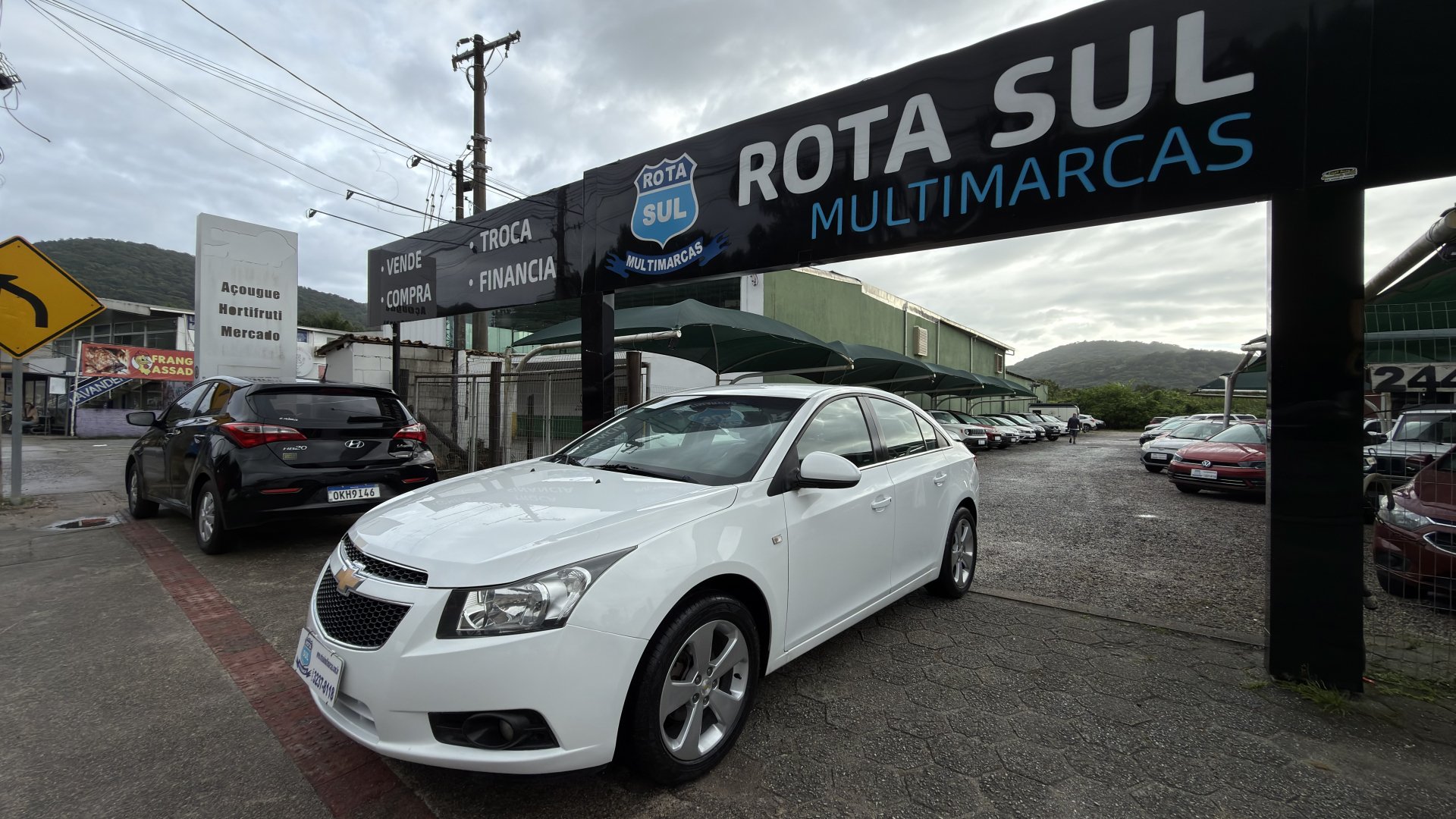 Chevrolet Cruze HB Sport LT 1.8 16V FlexP. 5p Mec na cor Branco em Florianópolis / SC - 987538