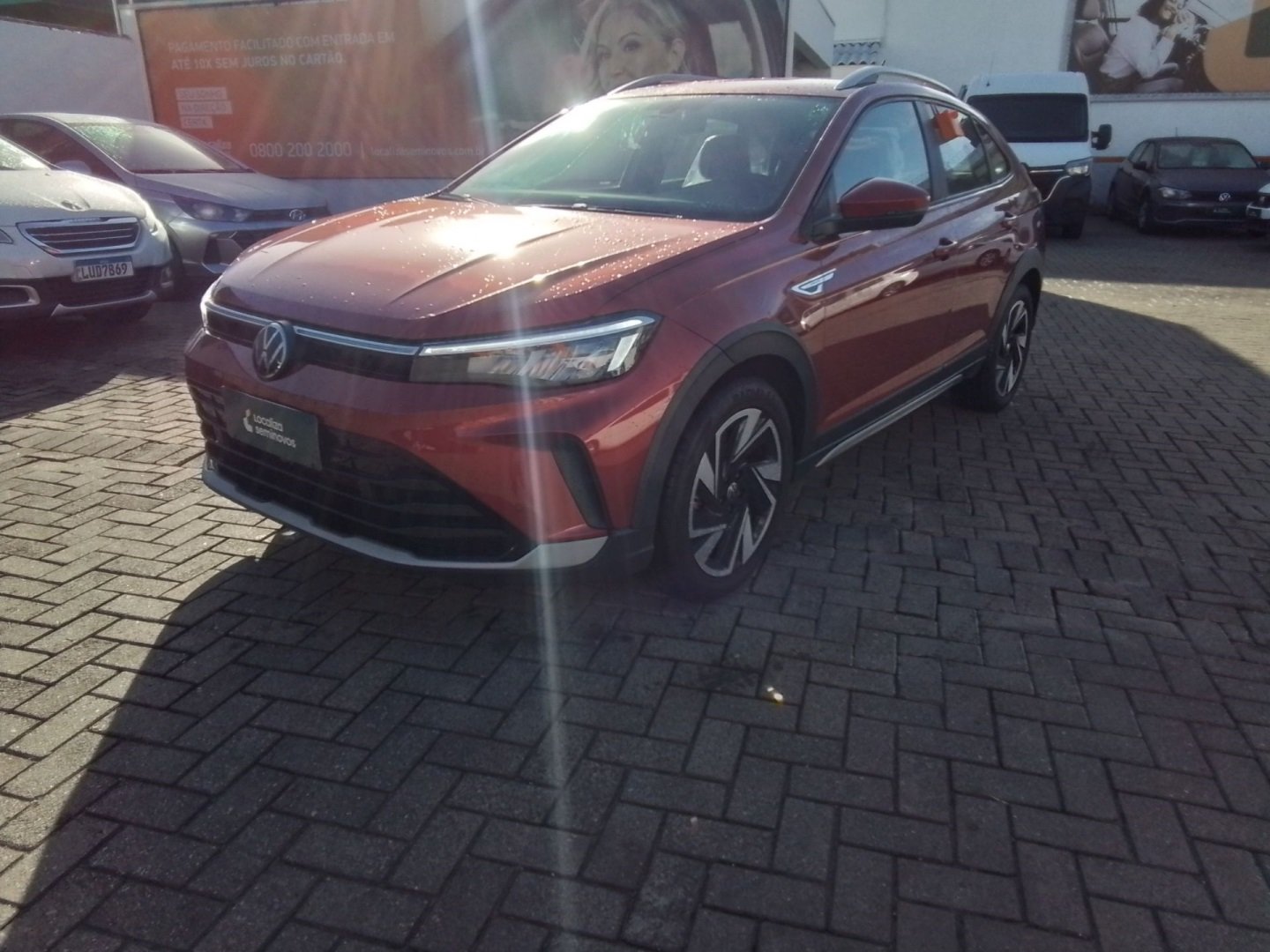Volkswagen Nivus Highline 1.0 200 TSI Flex Aut. na cor Vermelho no Gravataí / RS - 992125