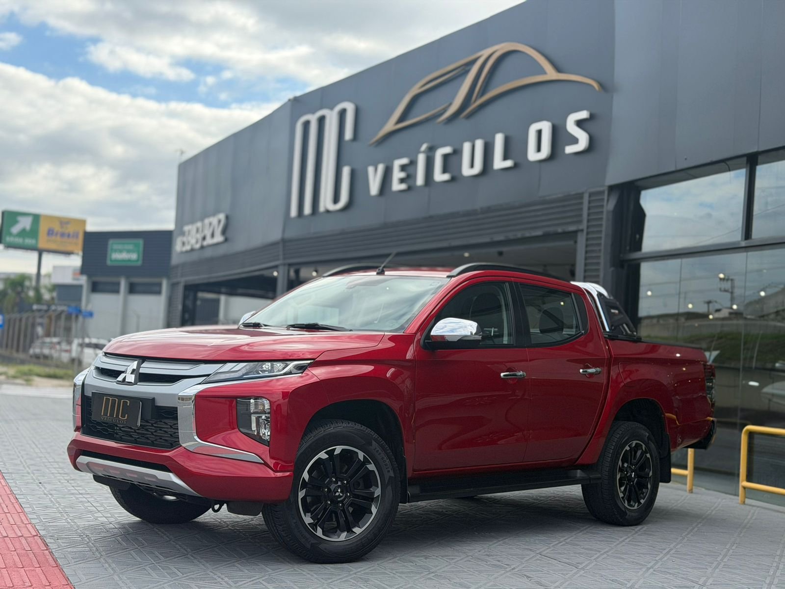 Mitsubishi L200 2.5 4x2 Turbo Diesel na cor Vermelho em São José / SC - 996955
